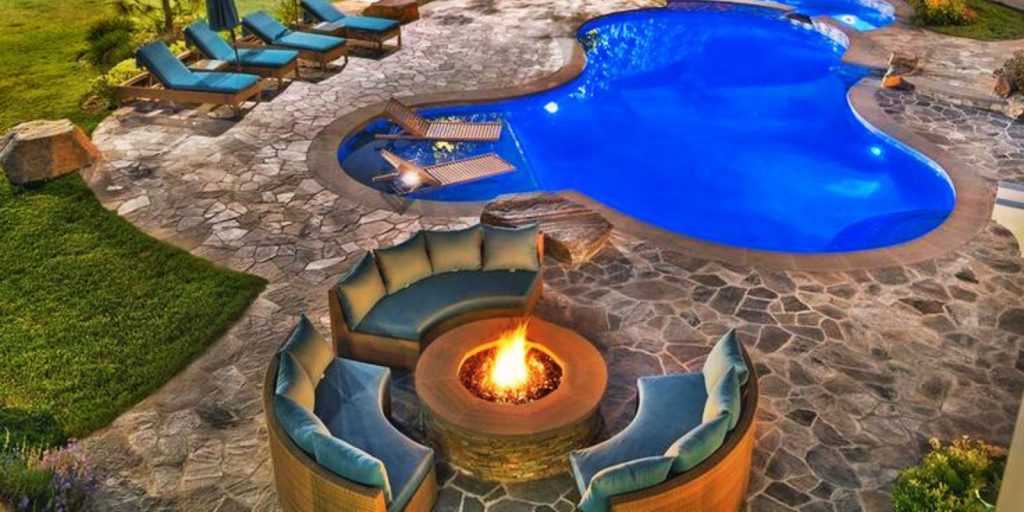 A beautiful firepit besides lagoon pool