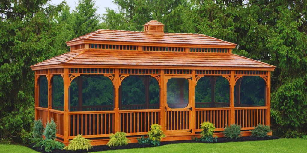 A gazebo with trees in the background