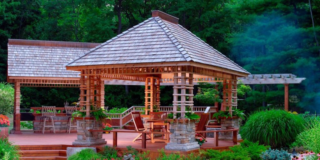 A Modern Gazebo that includes a deck equipped with chairs